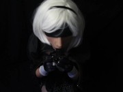 Silicone doll with 2B cosplay gives blowjob to strapon
