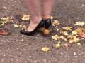 Crush fetish outdoors  Fat legs in high heel shoes crush apples