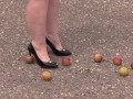 Crush fetish outdoors Fat legs in high heel shoes crush apples