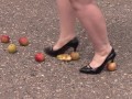 Crush fetish outdoors Fat legs in high heel shoes crush apples