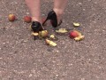 Crush fetish outdoors Fat legs in high heel shoes crush apples