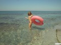 Awesome kinky nudist girl in sunglasses sucks & rides a huge dildo in public beach - Sasha Bikeyeva