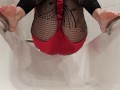 Wetting fishnet leggings feet in a bathtub