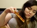 Bored Girl Chews On Pizza