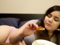 Bored Girl Chews On Pizza