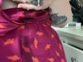 Milkymama teases milk filled tits through dress in short clip 