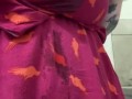 Milkymama teases milk filled tits through dress in short clip 