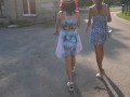 Two girls flashing pussy in public park, upskirt no panties