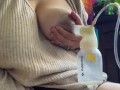 Milkymama pumps milk filled tits while rubbing hairy pussy