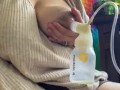 Milkymama pumps milk filled tits while rubbing hairy pussy