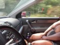 Flashing big tits in Saturday morning traffic 