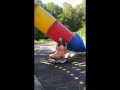 Beautiful, young exhibitionist girl shows off her beautiful body on the Playground