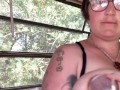 Milkymama in a bathing suit pumps milk filled tits while camping 