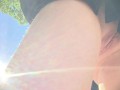 She is caught without panties in a short skirt in the Park. Up skirt close up
