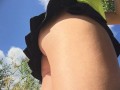 She is caught without panties in a short skirt in the Park. Up skirt close up