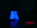 Mistress show beautiful feet in white socks in neon light, foot worship POV