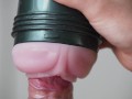 Extreme close up of cock in slow motion with Fleshlight and finished by cumshot