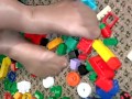 Sexy nylon feet walking on legos