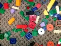 Sexy nylon feet walking on legos