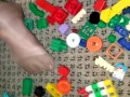 Sexy nylon feet walking on legos