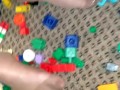 Sexy nylon feet walking on legos