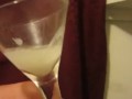 Cumming in a glass, ready to drink