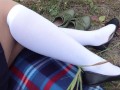 Schoolgirl in white socks changes shoes and shows her feet pantyhose knee socks