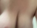 Milkymama hand expresses milk in the bathtub before emerging big tits in water 