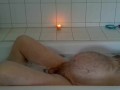 pregman in the bathtub with contractions