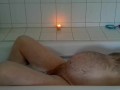 pregman in the bathtub with contractions
