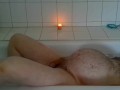 pregman in the bathtub with contractions
