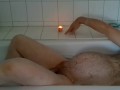 pregman in the bathtub with contractions