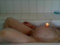 pregman in the bathtub with contractions