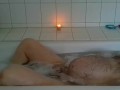 pregman in the bathtub with contractions