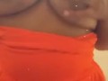 Playing with my big braless Titties in a public restroom 
