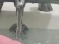 My feet in the bath playing with my rubber duck 