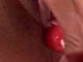 Masturbation with a lollipop