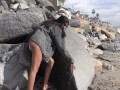 Strong Powerful Bikini Babe Pushes Rock