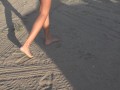 Following her sexy feet on the beach
