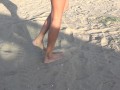 Following her sexy feet on the beach