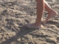 Following her sexy feet on the beach