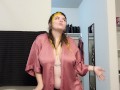 Goth girl gives playful strip tease dance in silk robe