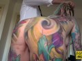 Dominated tattooed busty slut deep throats