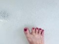 Cute toes in a bubble bath