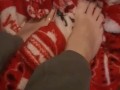 Cute tiny feet rubbing blanket