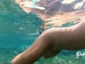 Naked adventures! Underwater sex games on a public beach ends in ruined orgasm.