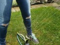 Wetting My Jeans Into sockless Shoes then soaking in the sprinkler