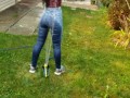 Wetting My Jeans Into sockless Shoes then soaking in the sprinkler