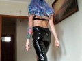 Sexy Bimbo domina walking and dancing in latex