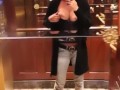 Flashing boobs in the elevator